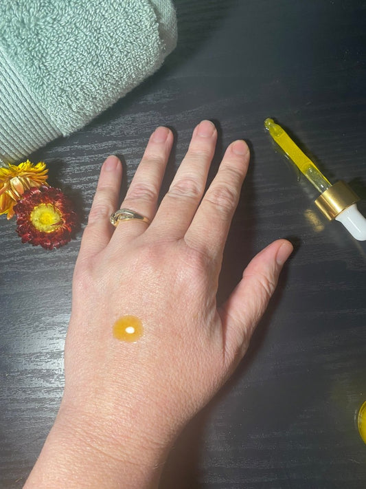 Buriti Silk Facial Treatment texture shown on hand, a lightweight unscented gel-cream facial treatment made with buriti oil Sulek Spa Company