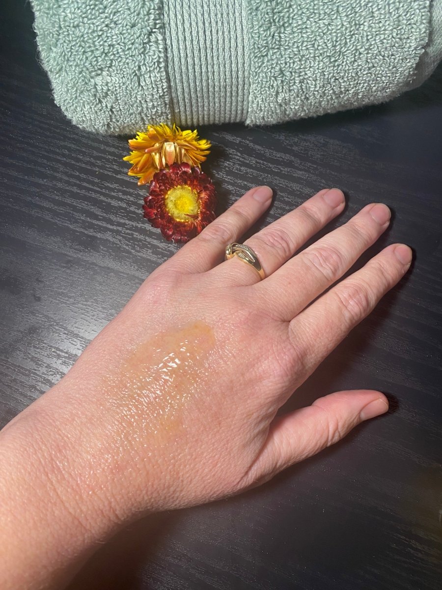 Buriti Silk Facial Treatment being spread on skin, demonstrating a silky lightweight texture with fast absorption Sulek Spa Company